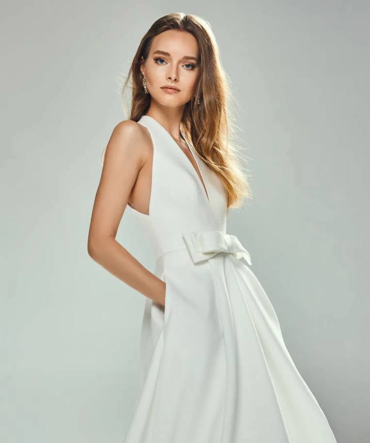 Model wearing a Jesus Peiro gown